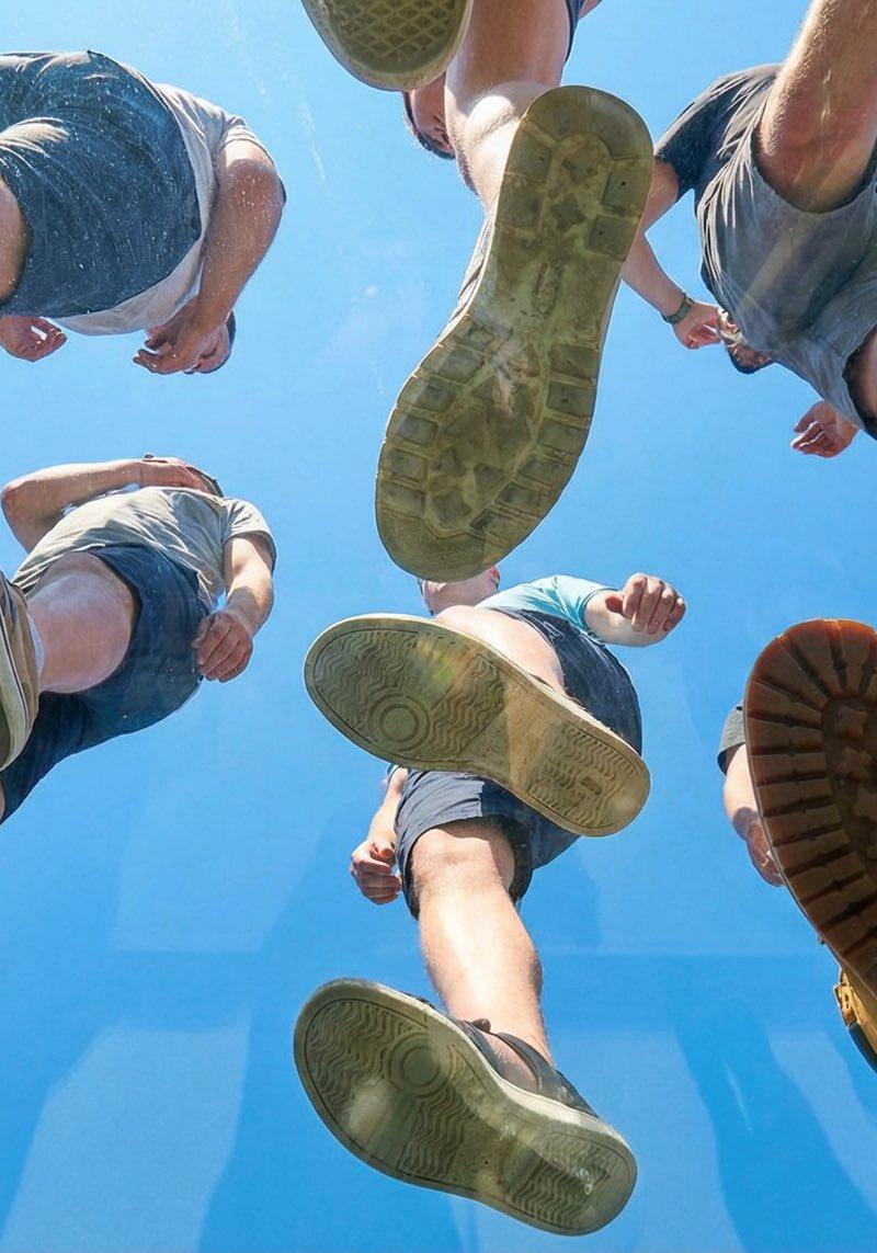 Plexiglass under-foot sky shot: GPT Image 2 prompt