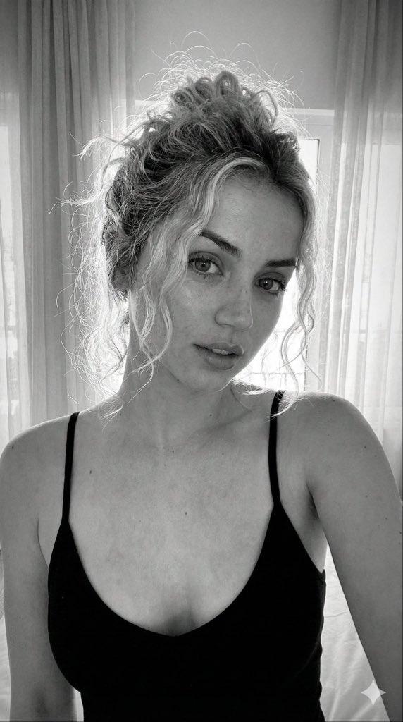 Freckled blonde messy bun portrait: GPT Image 2 prompt