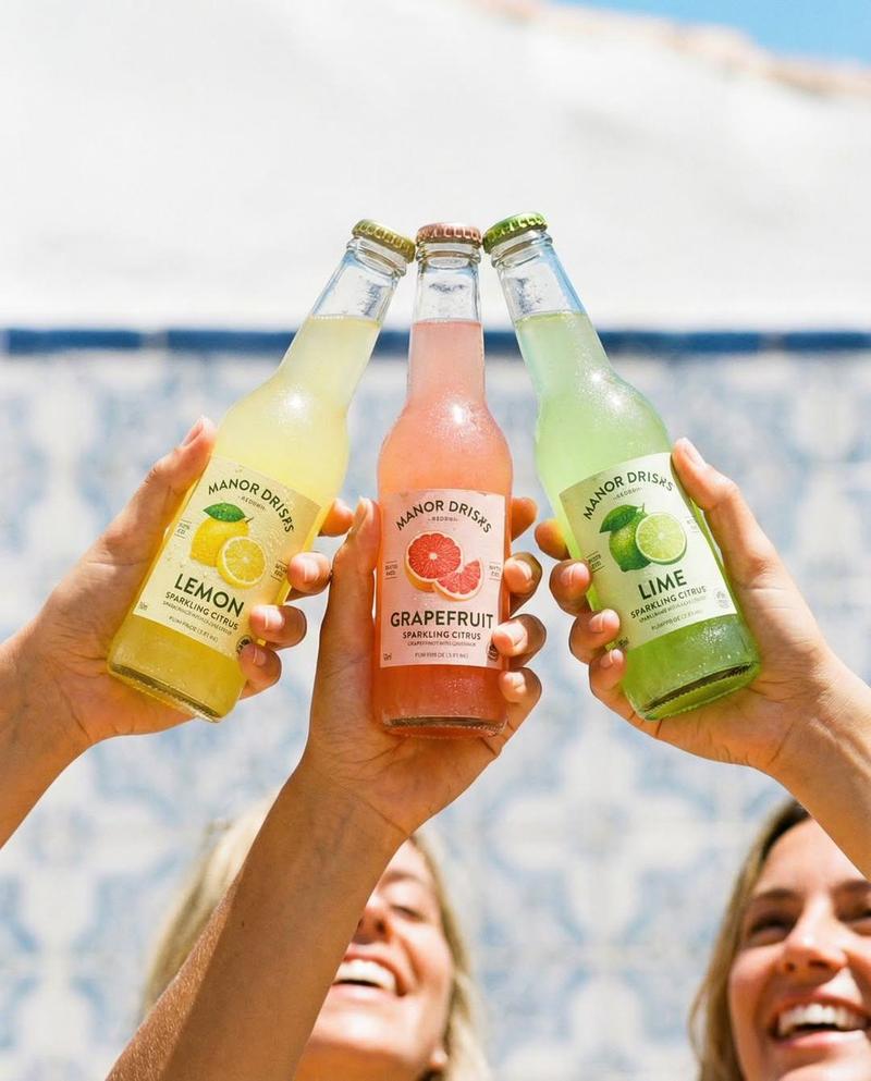 Three hands clinking sodas: GPT Image 2 prompt