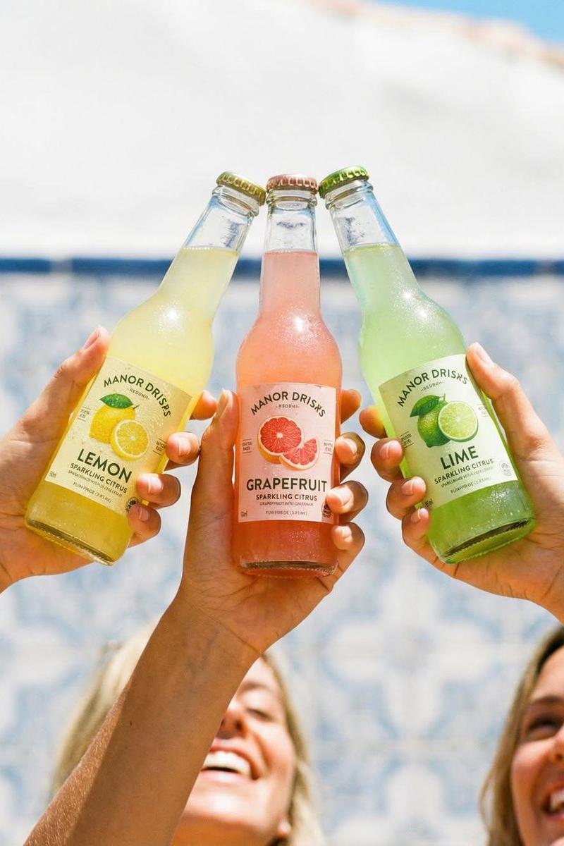 Three hands clinking sodas: GPT Image 2 prompt