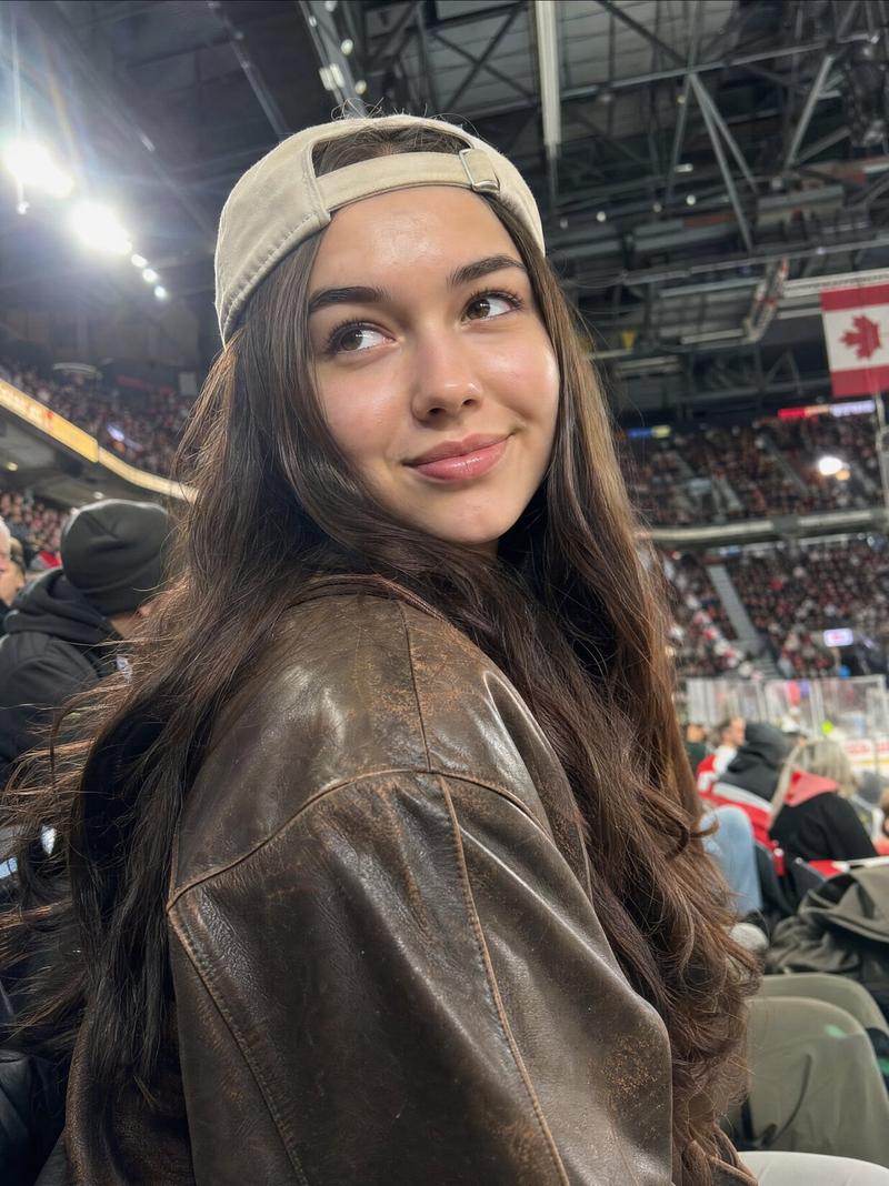 Stadium candid backwards cap portrait: GPT Image 2 prompt