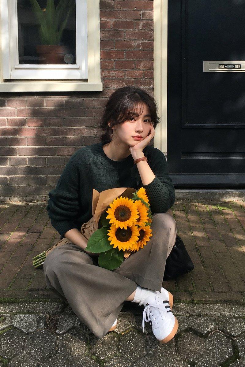 Sunflower sidewalk portrait: GPT Image 2 prompt
