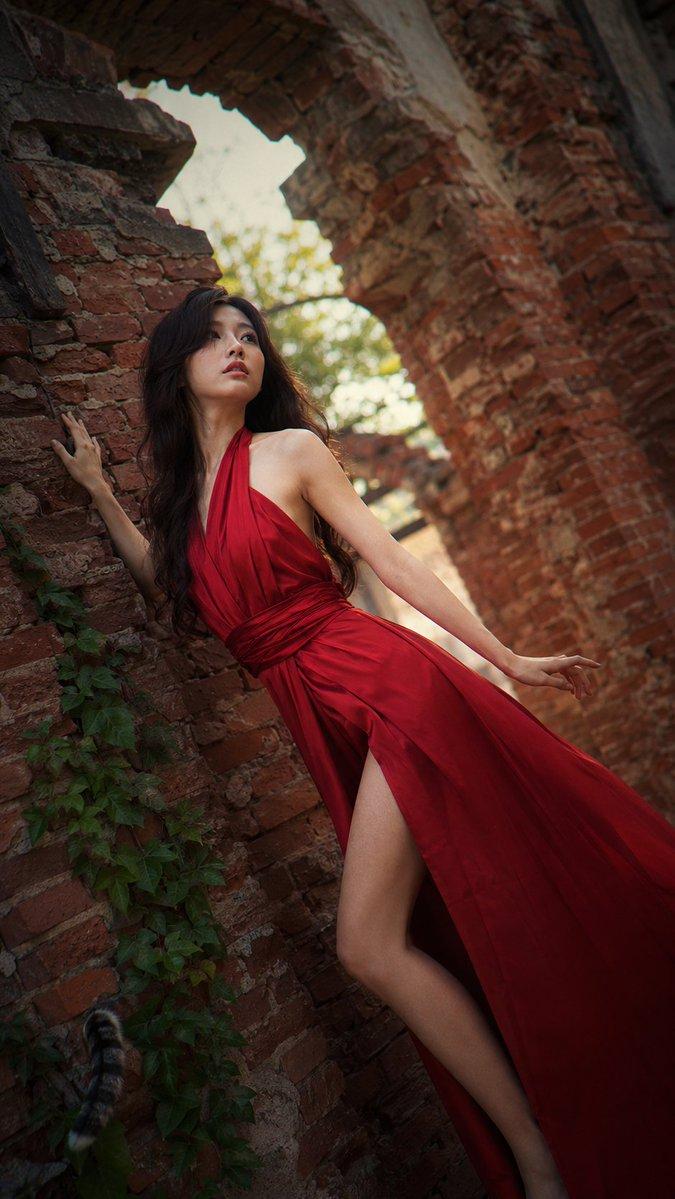 Crimson gown brick archway: GPT Image 2 prompt