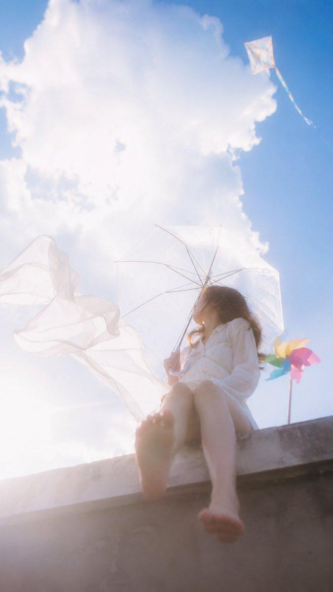 Dreamcore rooftop sky portrait: GPT Image 2 prompt