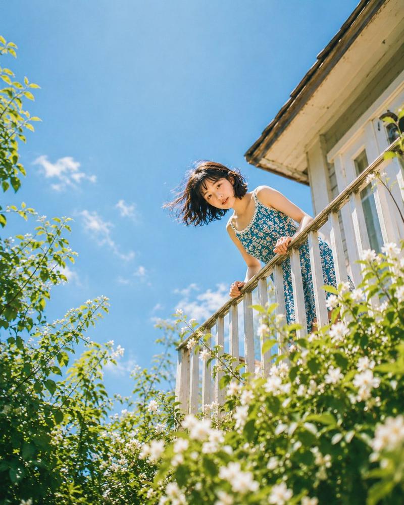 Low angle balcony flower portrait: GPT Image 2 prompt