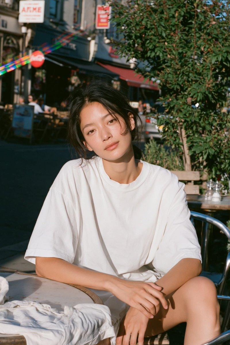Sunlit cafe terrace film portrait: GPT Image 2 prompt