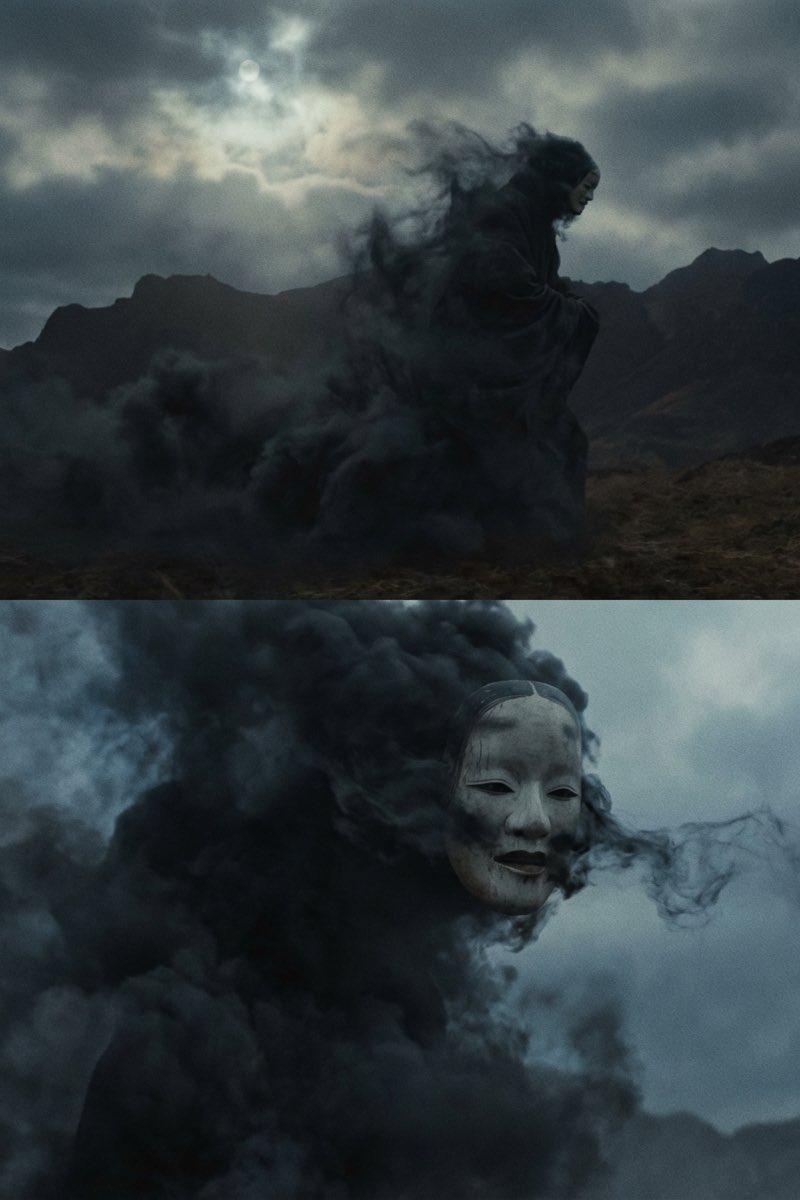 黑雾中浮现的巨型能面幻影