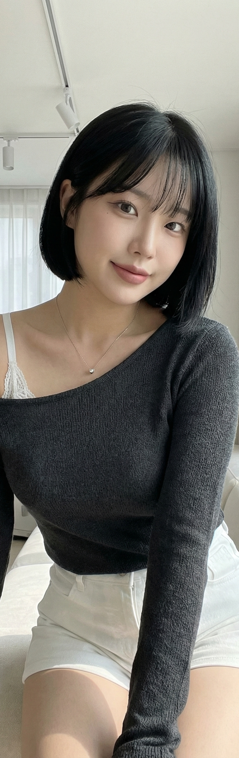 { "subject": { "description": "A young adult woman with a short black bob haircu