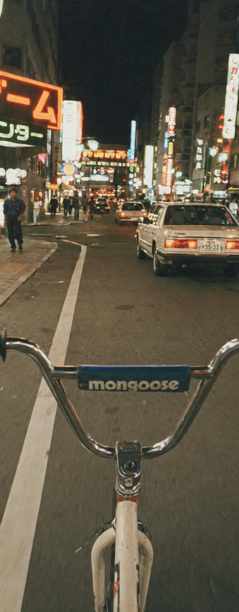first person shot on a 1980s bmx in 1980s Tokyo