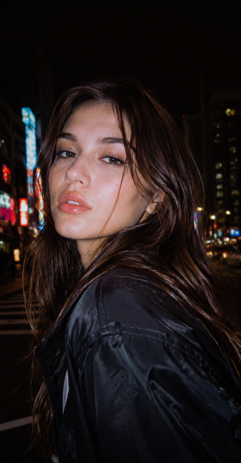 a cinematic night street portrait, y2k aesthetic, an extremely beautiful young w