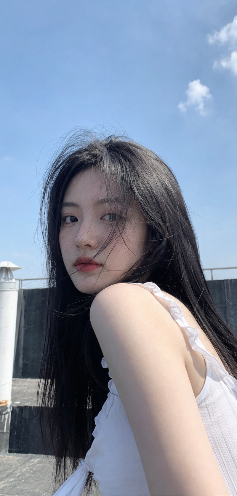A realistic smartphone-style outdoor vertical portrait, 9:16 aspect ratio