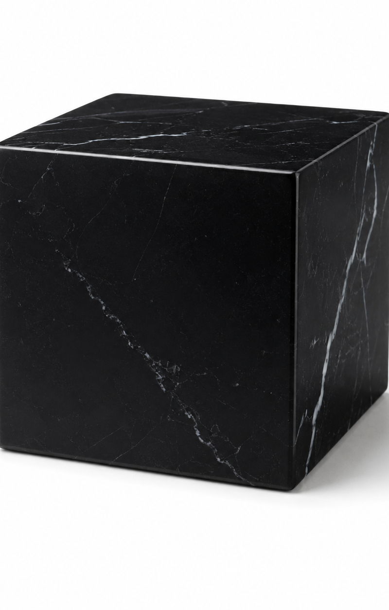 Minimal black marble cube on a white seamless studio background, soft shadow, pr