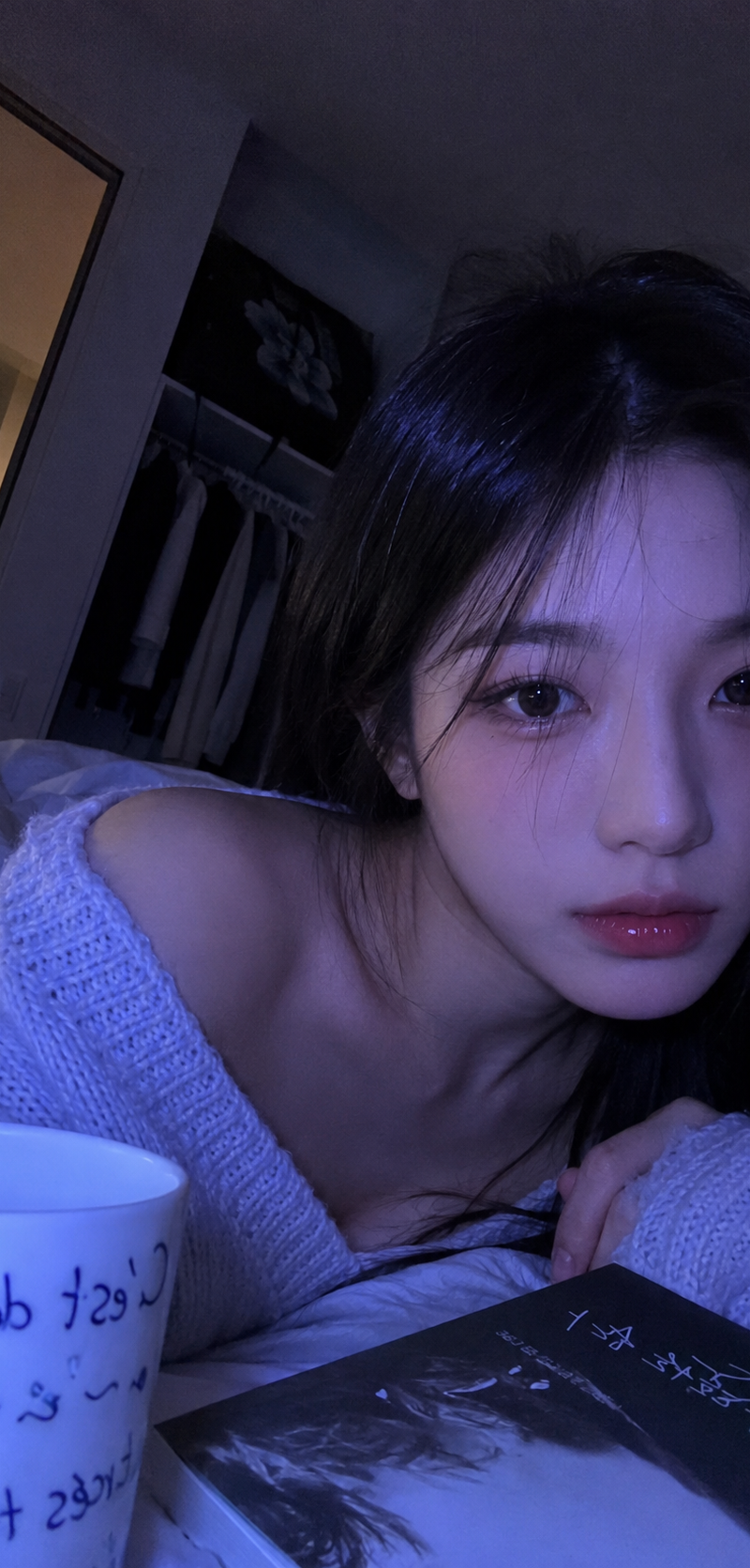 Vertical 9:16 close-up nighttime bedroom phone selfie portrait
