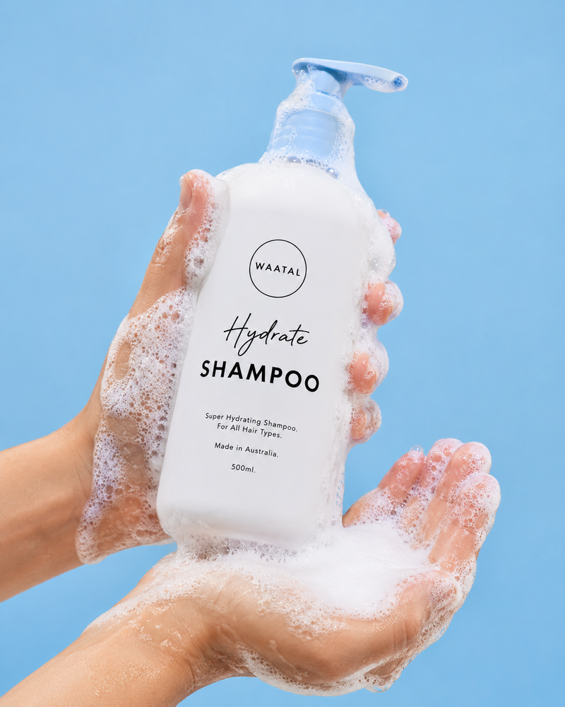{ "product_photography_prompt": { "subject": "Hands holding a shampoo bottle wit