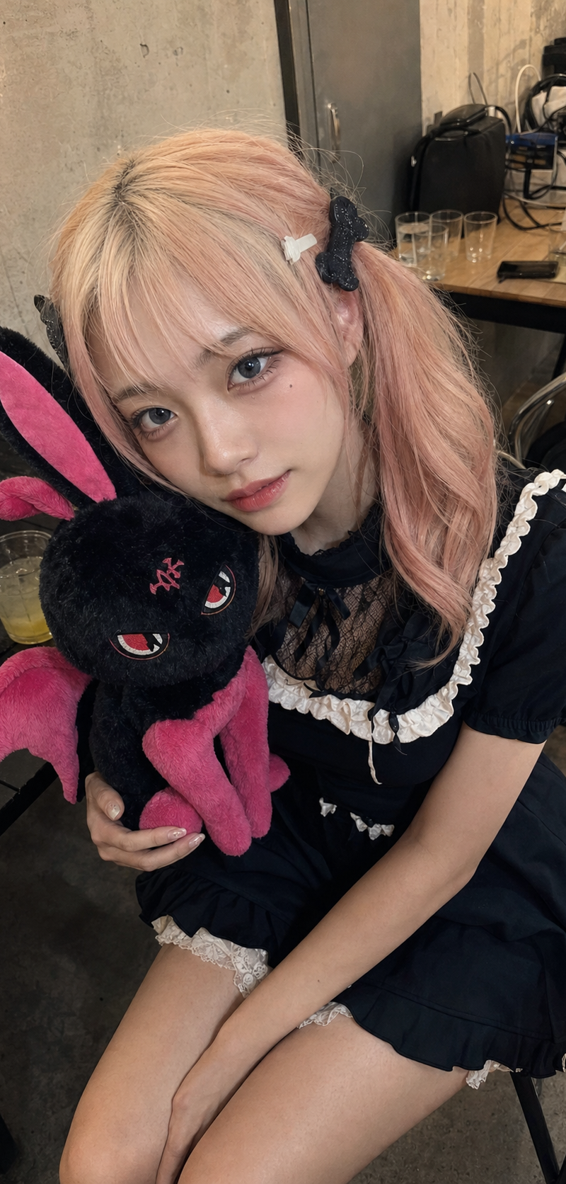 { "subject": { "description": "A young adult woman with pastel pink twin ponytai