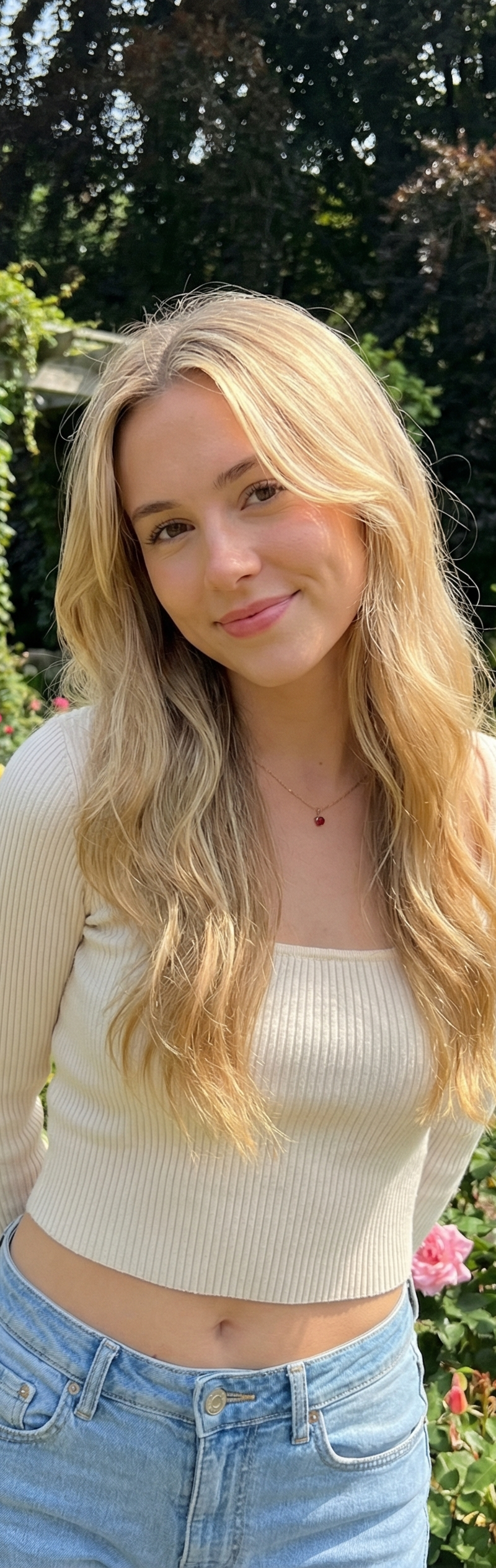 { "subject": { "description": "A young woman with long wavy blonde hair stands i