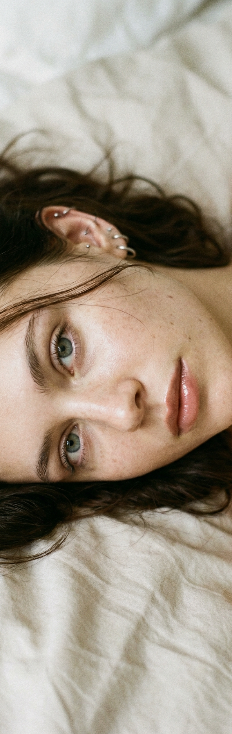 { "subject": { "description": "An ultra-close realistic portrait of a young woma